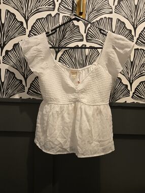 Smocked White Flutter-Sleeve Peplum Blouse